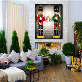 Two nutcrackers with whiskey bourbon glasses in hand displayed in a festive Christmas holiday decor room.
