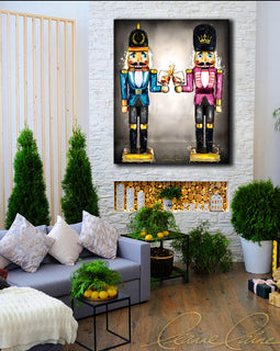 Two nutcrackers in pink and blue with whiskey bourbon glasses in hand displayed in a festive Christmas decor Holiday room