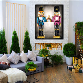 Two nutcrackers in pink and blue with whiskey bourbon glasses in hand displayed in a festive Christmas decor Holiday room
