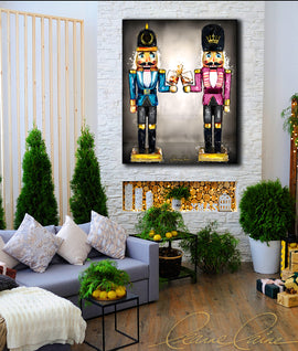 Two nutcrackers in pink and blue with whiskey bourbon glasses in hand displayed in a festive Christmas decor Holiday room