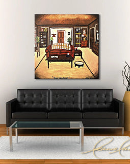 Living room with a black sofa, coffee table, and an abstract art collectable Friends TV show of Ross's apartment